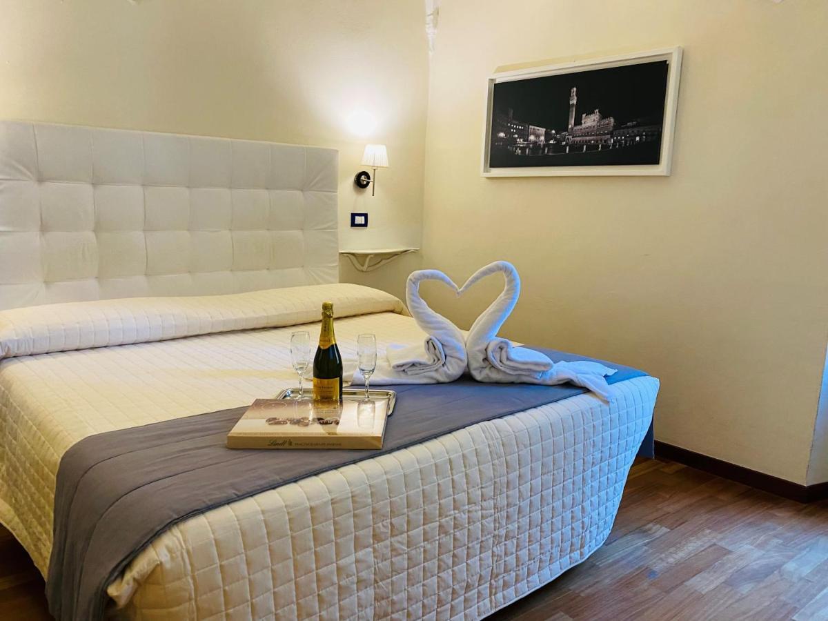 B&B Quattro Cantoni Siena Bagian luar foto